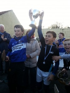 U11 tournament 2014 - Captains Raise Cup aloft